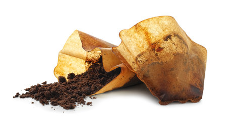 Used paper coffee filters isolated on whiteの写真素材