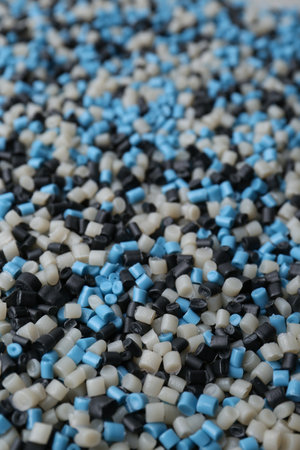 Pile of colorful plastic granules as background, closeupの写真素材