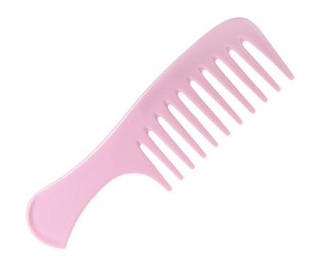 One pink plastic comb isolated on whiteの写真素材