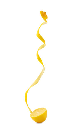 Fresh lemon peel and half of fruit isolated on whiteの写真素材