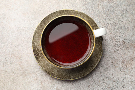Aromatic tea in cup on light grey table, top viewの写真素材