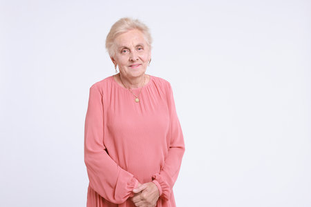 Portrait of senior woman on white background. Space for textの写真素材
