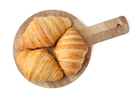 Tasty fresh croissants isolated on white, top view. Puff pastryの写真素材
