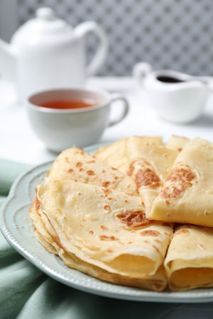 Delicious crepes served on white table, closeupの写真素材
