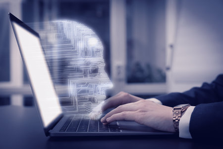 Businesswoman working on laptop at desk, closeup. Digital head coming out of computer symbolizing artificial intelligenceの写真素材