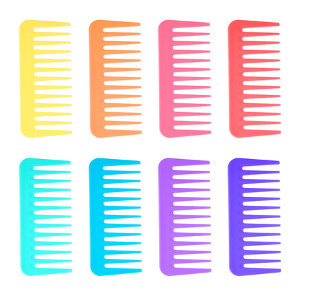 Combs of different colors isolated on whiteの写真素材