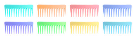 Combs of different colors isolated on whiteの写真素材