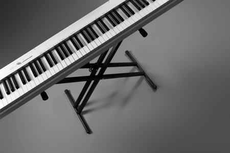 Synthesizer on grey background, above view. Electronic musical instrumentの写真素材