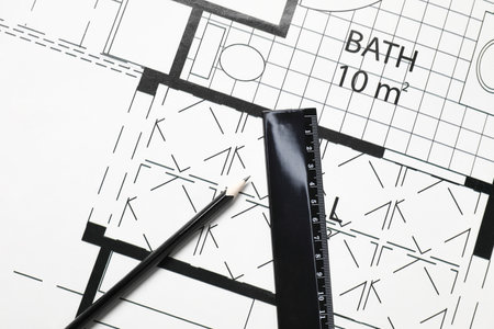 Ruler and pencil on different architectural drawings, top viewの写真素材