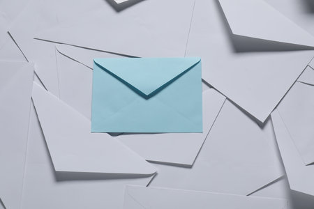 Paper envelopes as background, top view. Mockup for designの写真素材