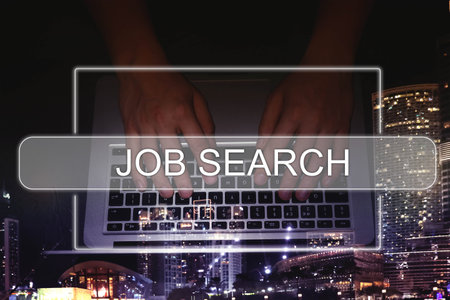 Job Search. Man using laptop, closeup. Double exposure with night cityscapeの写真素材