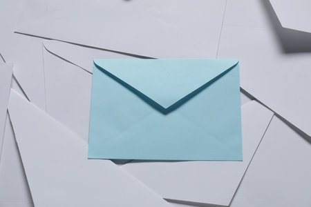 Paper envelopes as background, top view. Mockup for designの写真素材