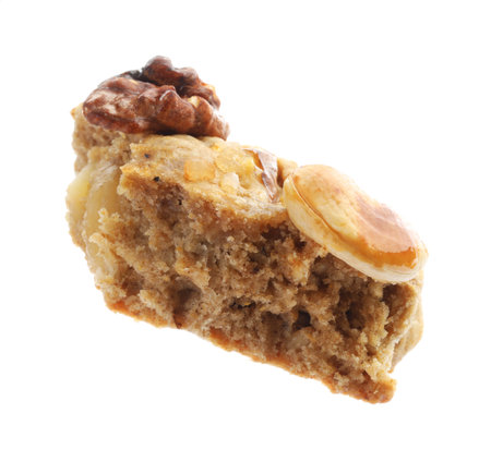 Piece of tasty cookie with nuts isolated on whiteの写真素材