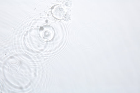 Rippled surface of clear water on white background, top viewの写真素材