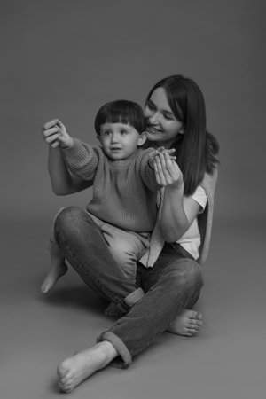 Happy mother with her little son, black and white effectの写真素材
