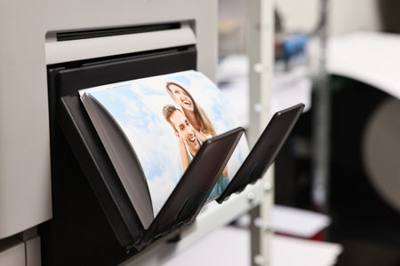 Modern printer with colorful photo indoors, closeupの写真素材