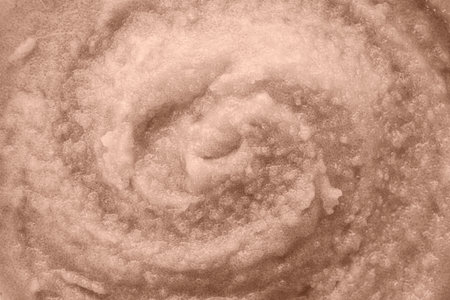 Scrub in shade of mocha mousse, closeup.
