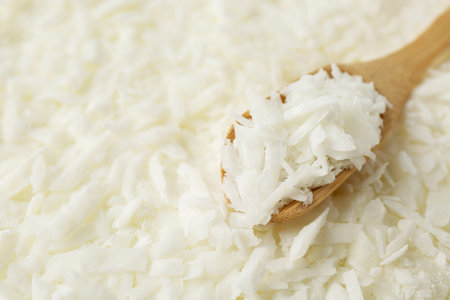 White soy wax flakes and spoon, closeupの写真素材