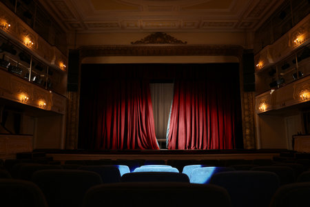 Theatre interior with stage and rows of comfortable seatsの写真素材