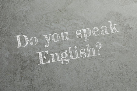 Do You Speak English? text on grey textured background.の写真素材