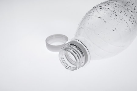 Empty plastic bottle on white background, closeupの写真素材