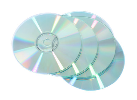 Many shiny compact discs isolated on whiteの写真素材