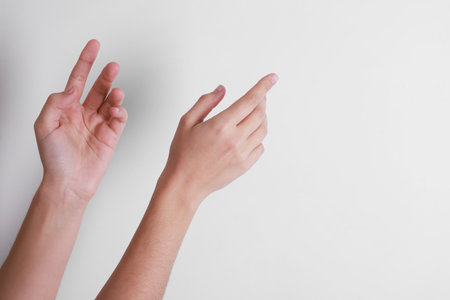 Hands on white background, closeup. Space for textの写真素材