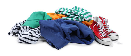 Pile of different used clothes isolated on whiteの写真素材