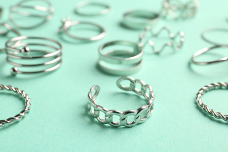 Different stylish accessories on turquoise background, closeupの写真素材