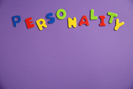 Word Personality made of colorful letters on purple background, top view. Space for text