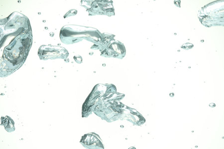 Many water bubbles on white background, closeup