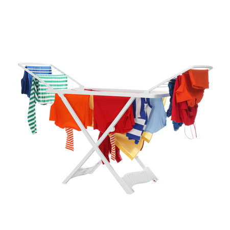 Drying rack with fresh clean laundry isolated on whiteの写真素材