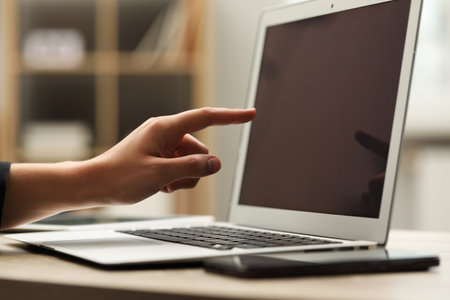 Person using laptop at table, closeup. Modern technologyの写真素材