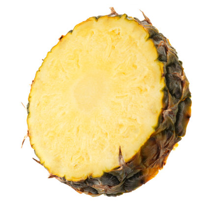 One slice of ripe pineapple isolated on whiteの写真素材