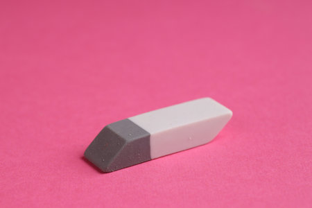 One eraser on pink background, closeup viewの写真素材