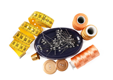 Different sewing supplies isolated on white, top view