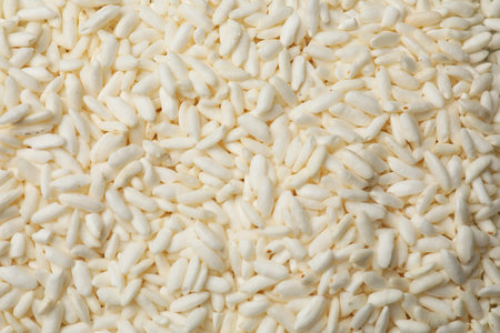 Wholegrain puffed rice as background, closeup viewの写真素材