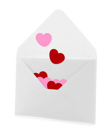 Paper hearts in envelope on white background. love letter