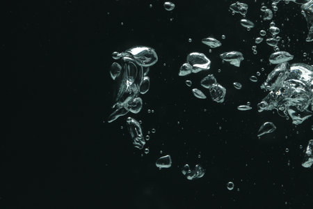 Many water bubbles on black background, closeup. Space for textの写真素材