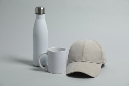 Different blank items on light grey background. Mockup for design