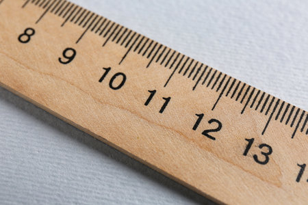 One wooden ruler on light grey background, closeupの写真素材
