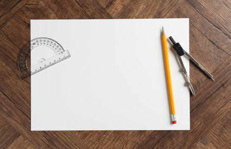 Ruler, paper, compass and pencil on wooden table, flat lay. Space for text