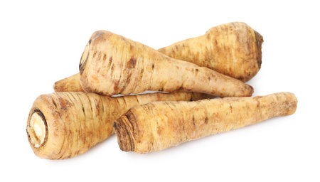 Many fresh parsnips isolated on white. Root vegetableの写真素材