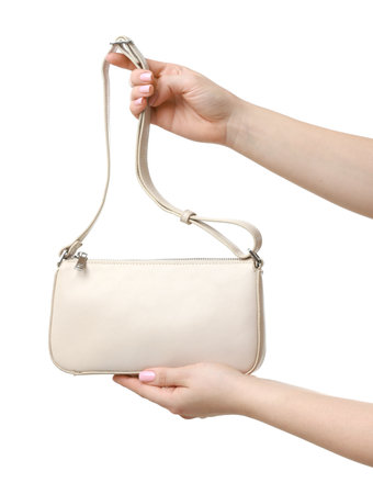 Woman with beautiful handbag on white background, closeup. Stylish accessoryの写真素材