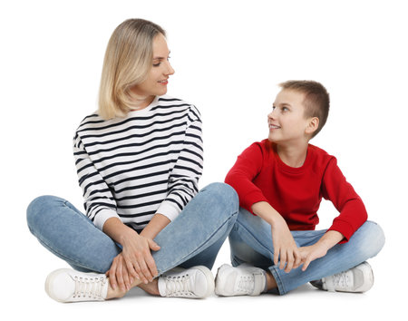 Happy mother and son on white backgroundの写真素材
