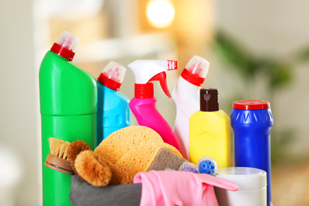 Different cleaning supplies against blurred background, closeupの写真素材