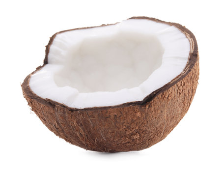Half of cracked coconut isolated on whiteの写真素材