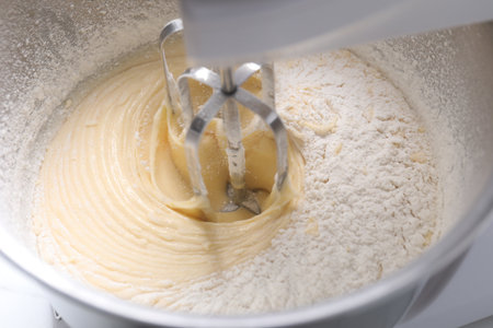 Making dough in bowl of stand mixer, closeupの写真素材