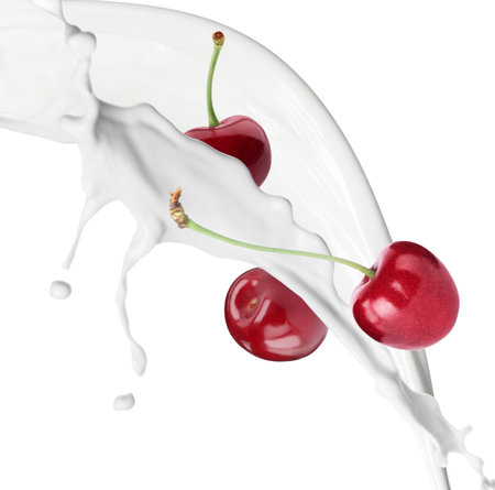 Milkshake with fresh cherries on white backgroundの写真素材