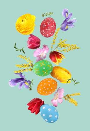 Easter eggs and beautiful spring flowers flying on pastel turquoise background